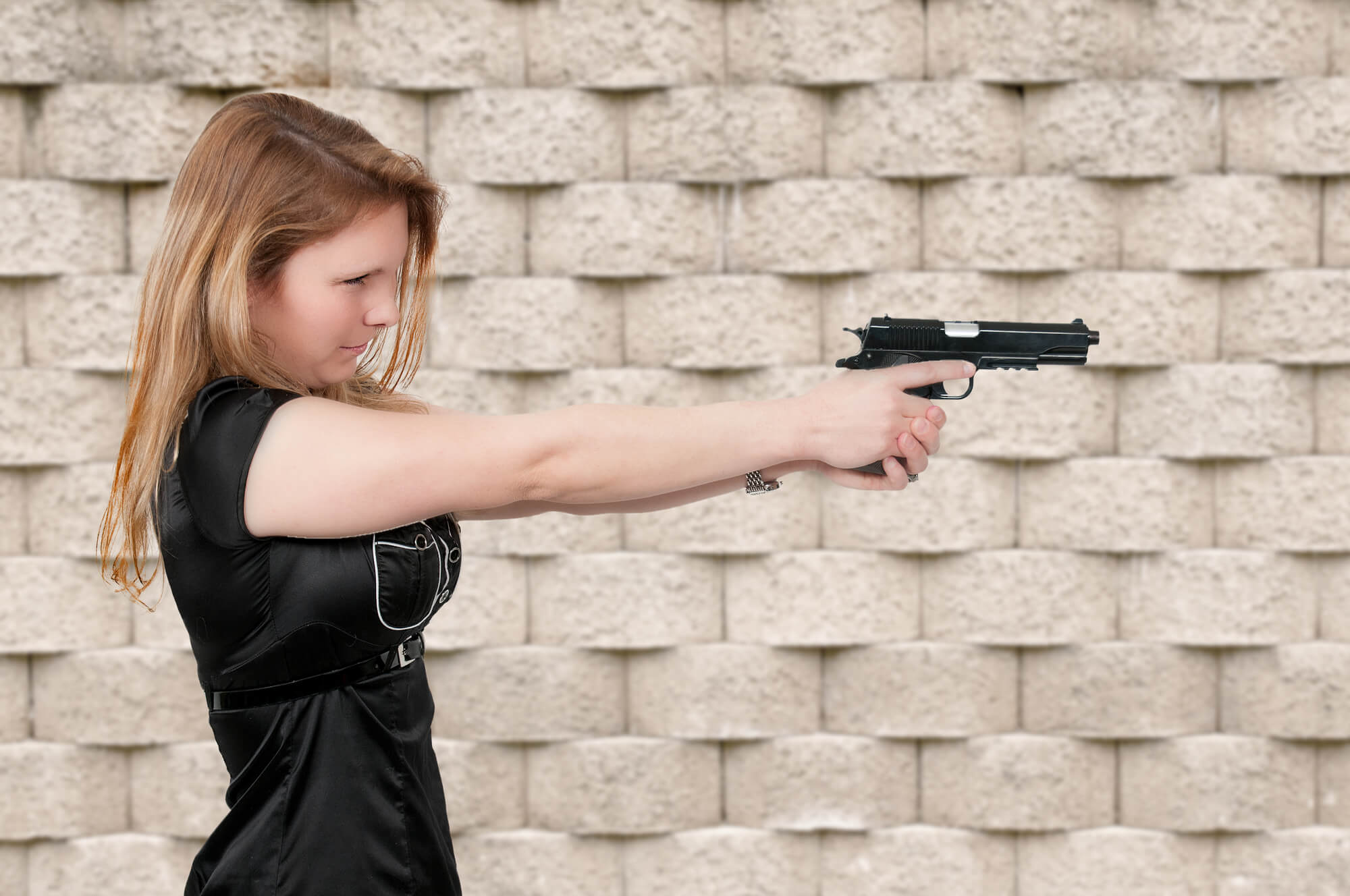 Woman holding a gun