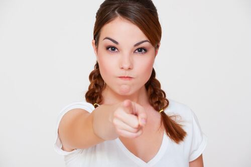 Woman pointing at someone